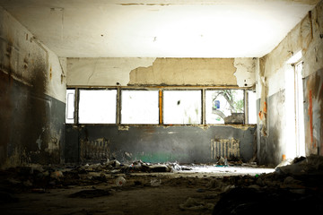 Abandoned building interior. Partially ruined warehouse building from the Post Soviet era.