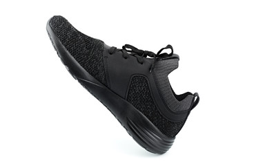 Sport shoes isolated on white background. Black sneakers running shoes. Casual shoes. Youth style. Shoes for fitness, running, yoga.