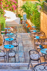 Street cafe on the stairs in Plaka in Athens