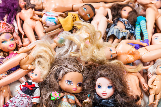 MOSCOW, RUSSIA - JUNE 17, 2019: various abandoned used fashion dolls ( Barbie, Ken, Shelly, Chelsea, Kelly, Bratz, Moxie, My Scene, Winx, Witch, etc) close up