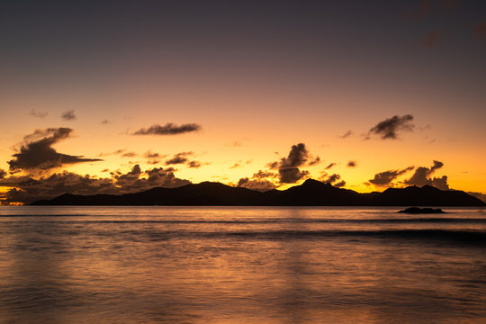 Orange sunset over praslin island ,seychells