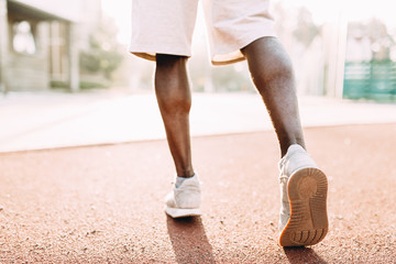 Sports man Jogging, or exercise in the stadium early in the morning © Shopping King Louie