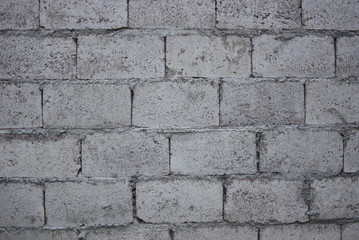 Brick of concrete wall with hollow bricks