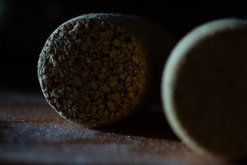 Wooden Wine Cork On Black Background Close-Up, Macro