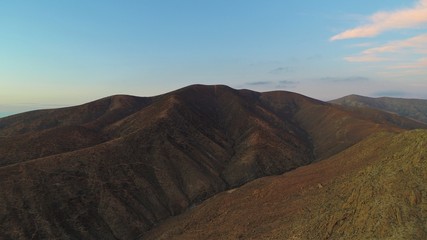walk through a beautiful landscape with the sunset between the sky and the land