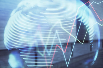 Double exposure of stock market graph and globe hologram on empty exterior background. Concept of...