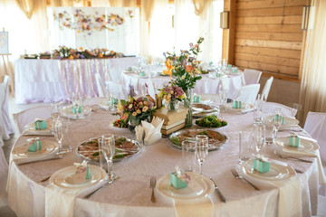 Served for banquet restaurant table with dishes, snack, wine glasses