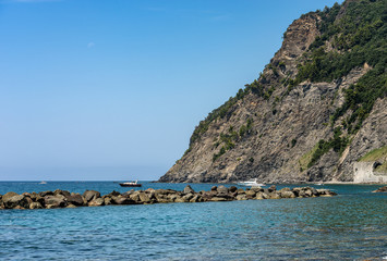 Fototapeta na wymiar Mediterranean Sea with cliff and coastline near the small Village of Framura. La Spezia, Liguria, Italy, Europe
