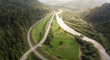 Aerial view to road with moutains captured from above