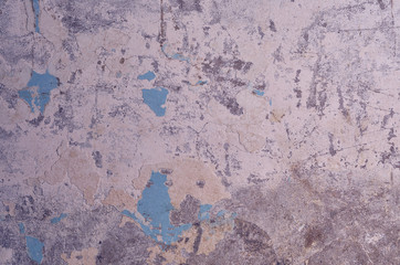 texture of the old battered wall blue peeling paint, concrete, gray cement grunge