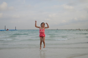 girl running on the beach