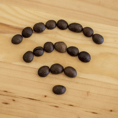 Wifi symbol drawn from coffee beans