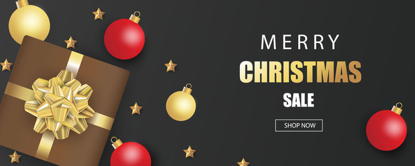Merry Christmas and Happy New Year. Christmas sale banner in black background with gifts box and decoration.