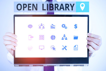 Word writing text Open Library. Business photo showcasing online access to analysisy public domain and outofprint books Male human holding thick textured cardboard of business promotion concept
