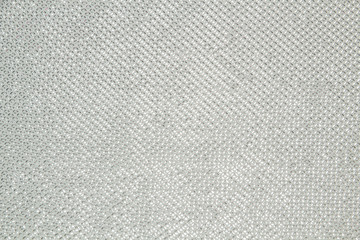 Fototapeta na wymiar Fabric knitwear lurex background texture