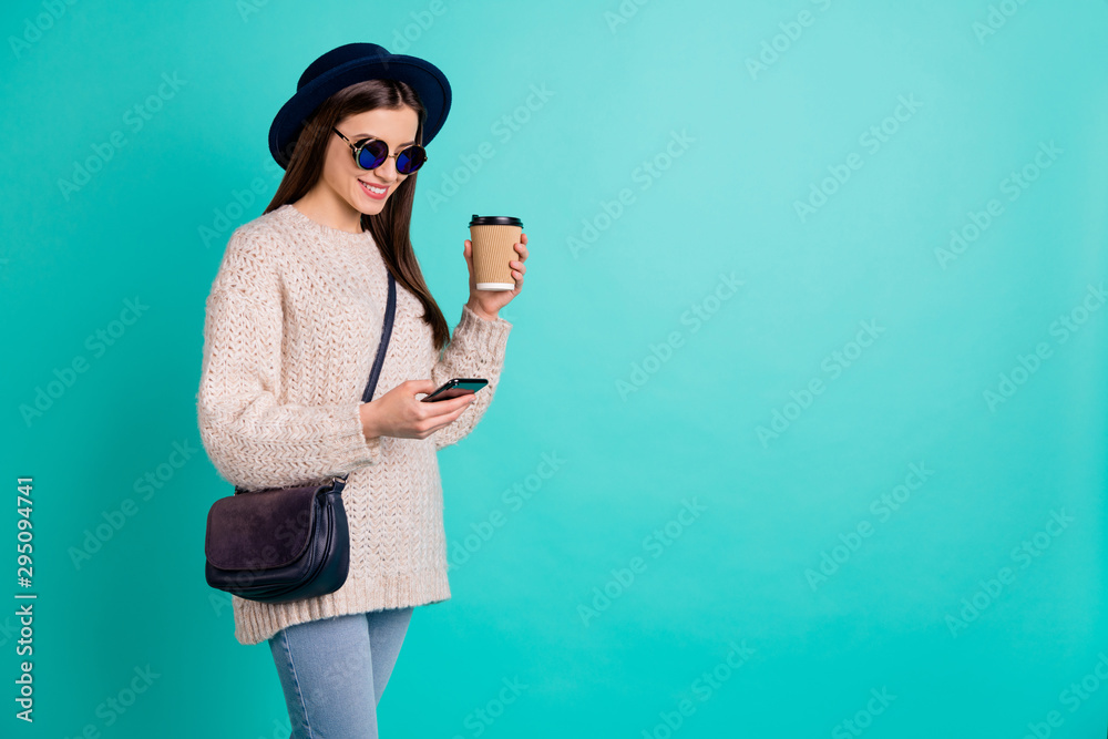 Sticker portrait of cheerful lady use her phone follow blogs wear stylish trendy vintage jumper denim jeans 