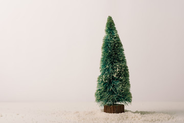 Christmas tree on bright background