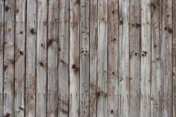 Old rustic wooden wall background planks weathered with nails