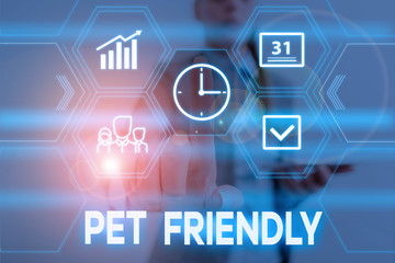Conceptual hand writing showing Pet Friendly. Concept meaning used to describe a place that is suitable or allowed for pets Woman wear work suit presenting presentation smart device