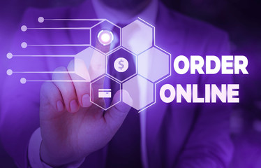 Conceptual hand writing showing Order Online. Concept meaning activity of buying products or services over the Internet Male wear formal suit presenting presentation smart device