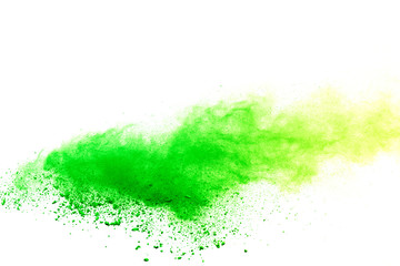 Green powder explosion on white background.