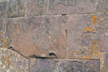 Natural stone abstract background wall made by ancient Inca of Peru in South America. Background with copy space