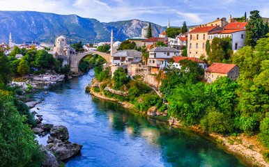 Mostar - iconic old town with famous bridge in Bosnia and Herzegovina. popular tourist destination - obrazy, fototapety, plakaty
