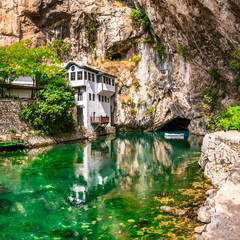 Fototapeta na wymiar Blagaj Tekija: Beautiful Monastery Under A Cliff. Landmarks of Bosnia and Herzegovina