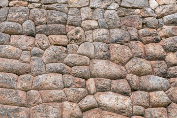 Natural stone abstract background wall made by ancient Inca of Peru in South America. Background with copy space