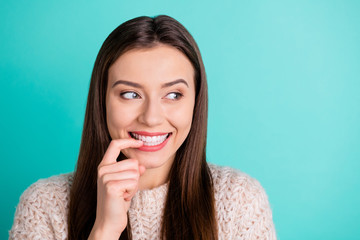 Fototapeta premium Close up photo of cute pretty teen girl think have plans for weekend bad habit wear knitted sweater isolated over teal turquoise color background