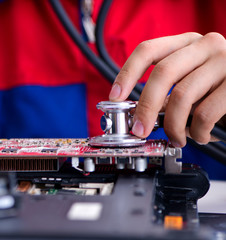 Repairman working in technical support fixing computer laptop tr