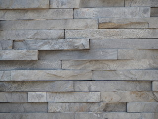 Modern brick wall. Wall Rocks. Stone wall texture background natural color.