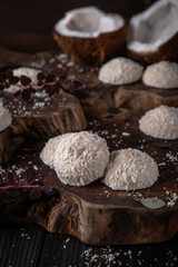 Coconut biscuit with caramel. Crispy and crumbly delicious cookies  with natural ingredients: flour, nuts, seeds, pieces of chocolate, cocoa, fruit jams. Stylish still life for poster.