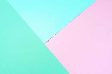 Background in trendy green and pink colors. Fashionable paper. Top view. Minimal concept. Trendy...