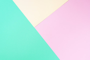 Colorful trendy green and pink paper background. Top view. Copy space