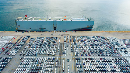 Aerial view cargo ship transportation of business logistic sea freight, New Cars produced by year...