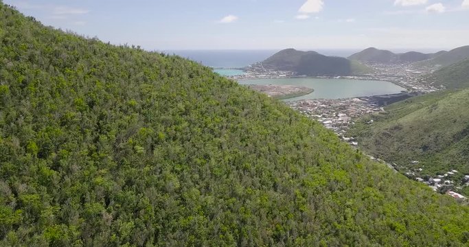 Drone cinematographic video of Philipsburg as seen from the hills in Sint Maarten Saint Martin