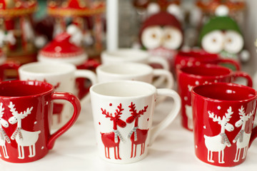 Obraz na płótnie Canvas Set of mugs with deer of Christmas theme.