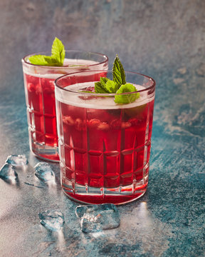 Elderberry cordial with ice and mint in glass