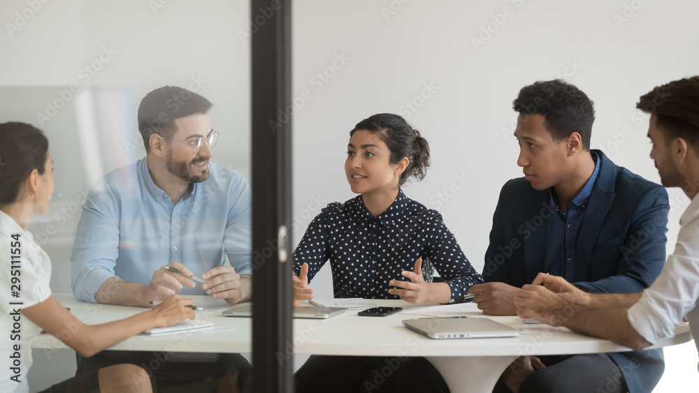 Poster Female indian company representative talking at group briefing at table