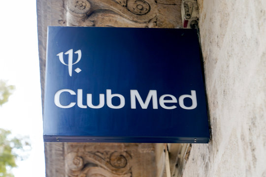Club Méditerranee sign store Club Med logo shop travel agency all-inclusive holidays