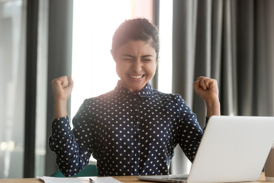 Happy Overjoyed Indian Business Woman Winner Celebrate Computer Win