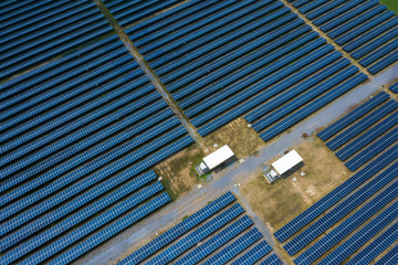Solar Photovoltaic of aerial top view, solar plants rows array of ground mount system Installation