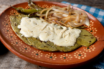 Mexican grilled nopal cactus with melted cheese and serrano peppers