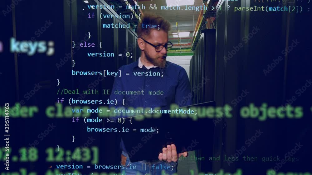 Wall mural server room with the male programmer and the code appearing along him