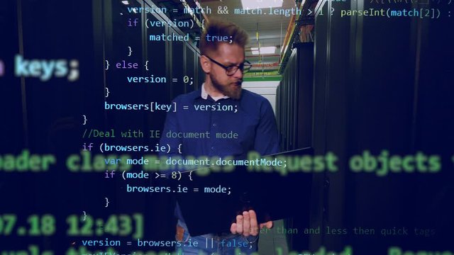 Server room with the male programmer and the code appearing along him