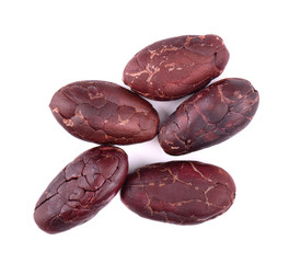 Peeled cacao beans, isolated on white background. Roasted and aromatic cocoa beans, natural chocolate.