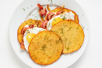 potato pancakes with bacon and eggs