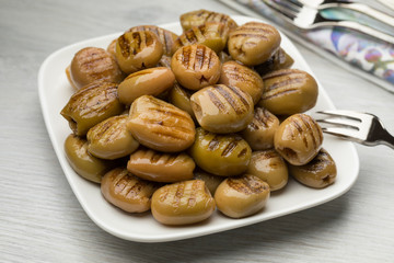 Dish with grilled green olives