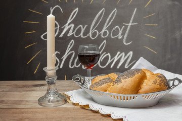 Homemade challah, wine for Kiddush and candles for Shabbat